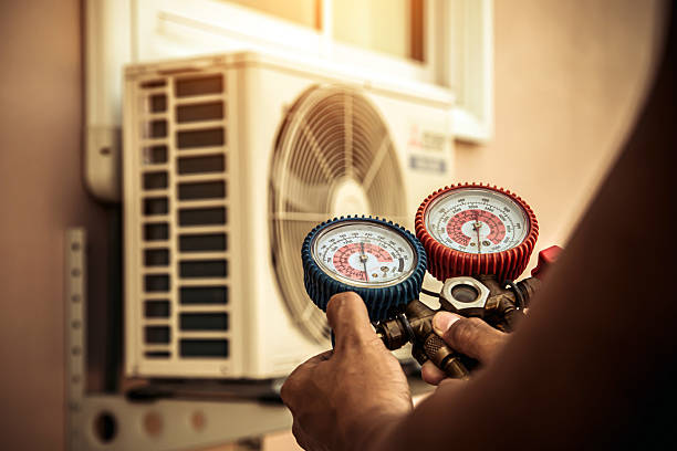 Professional Air Conditioning Service technician working in North Chicago, IL